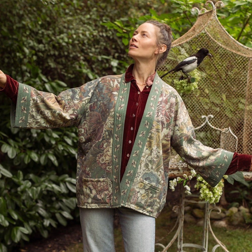
                  
                    Love Grows Wild Cottage Cardigan featuring 1700s floral etchings and bumblebee trim – cozy fleece-lined cardigan perfect for cooler days – Market of Stars.
                  
                