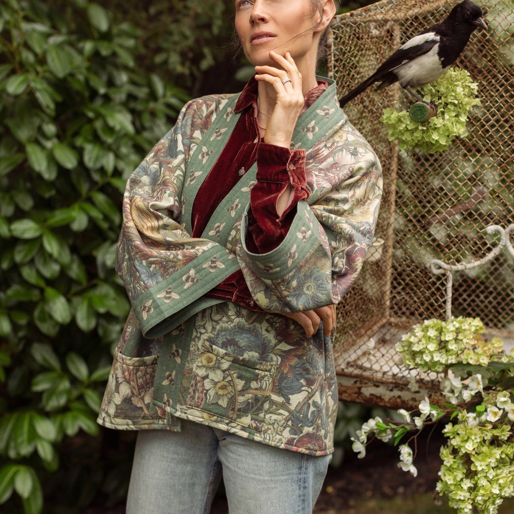 
                  
                    Love Grows Wild Cottage Cardigan featuring 1700s floral etchings and bumblebee trim – cozy fleece-lined cardigan perfect for cooler days – Market of Stars.
                  
                