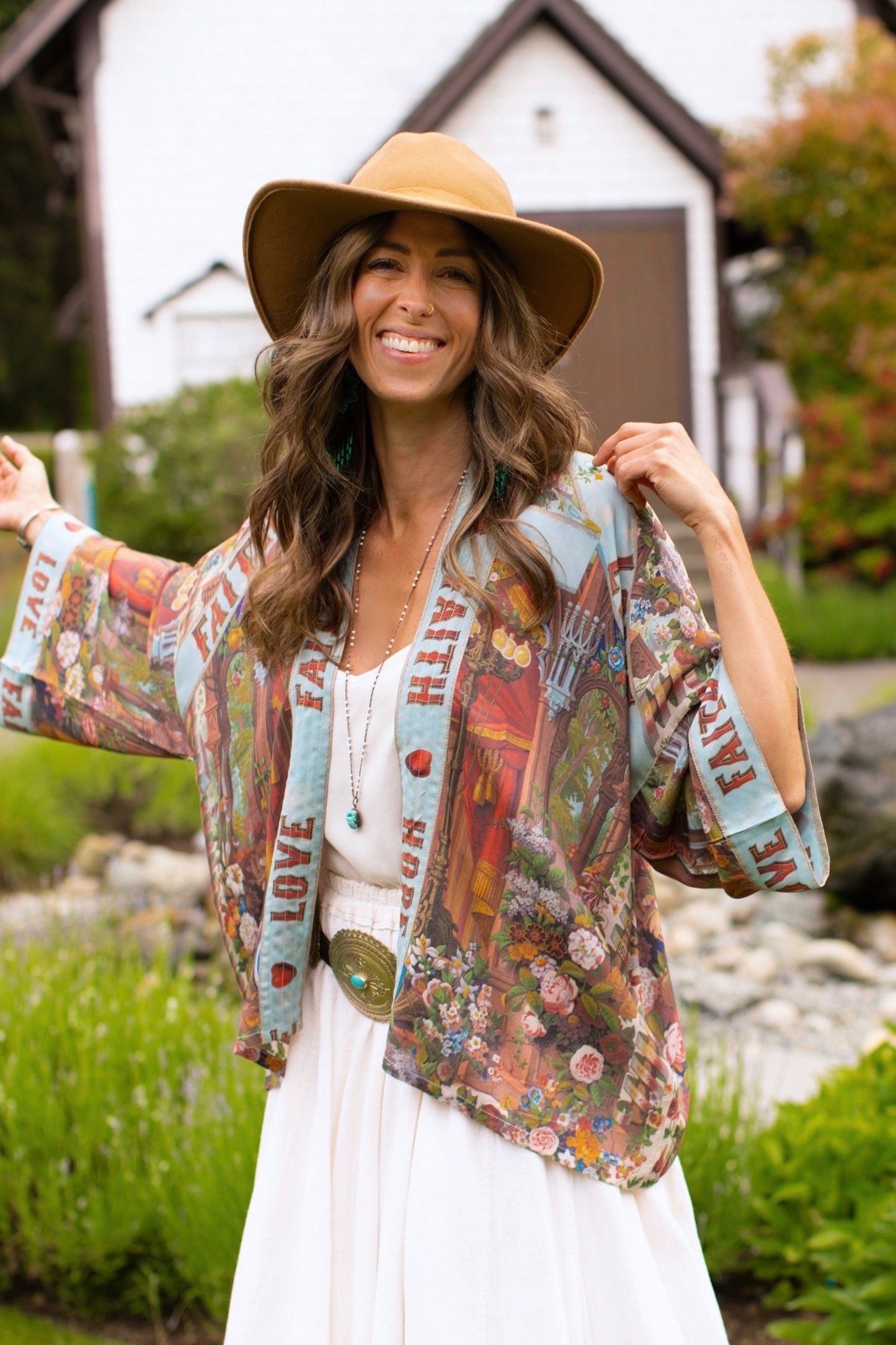 Model in cropped kimono featuring joyful 1854 floral art, heart-in-hand symbol, and handwritten love notes – Market of Stars.