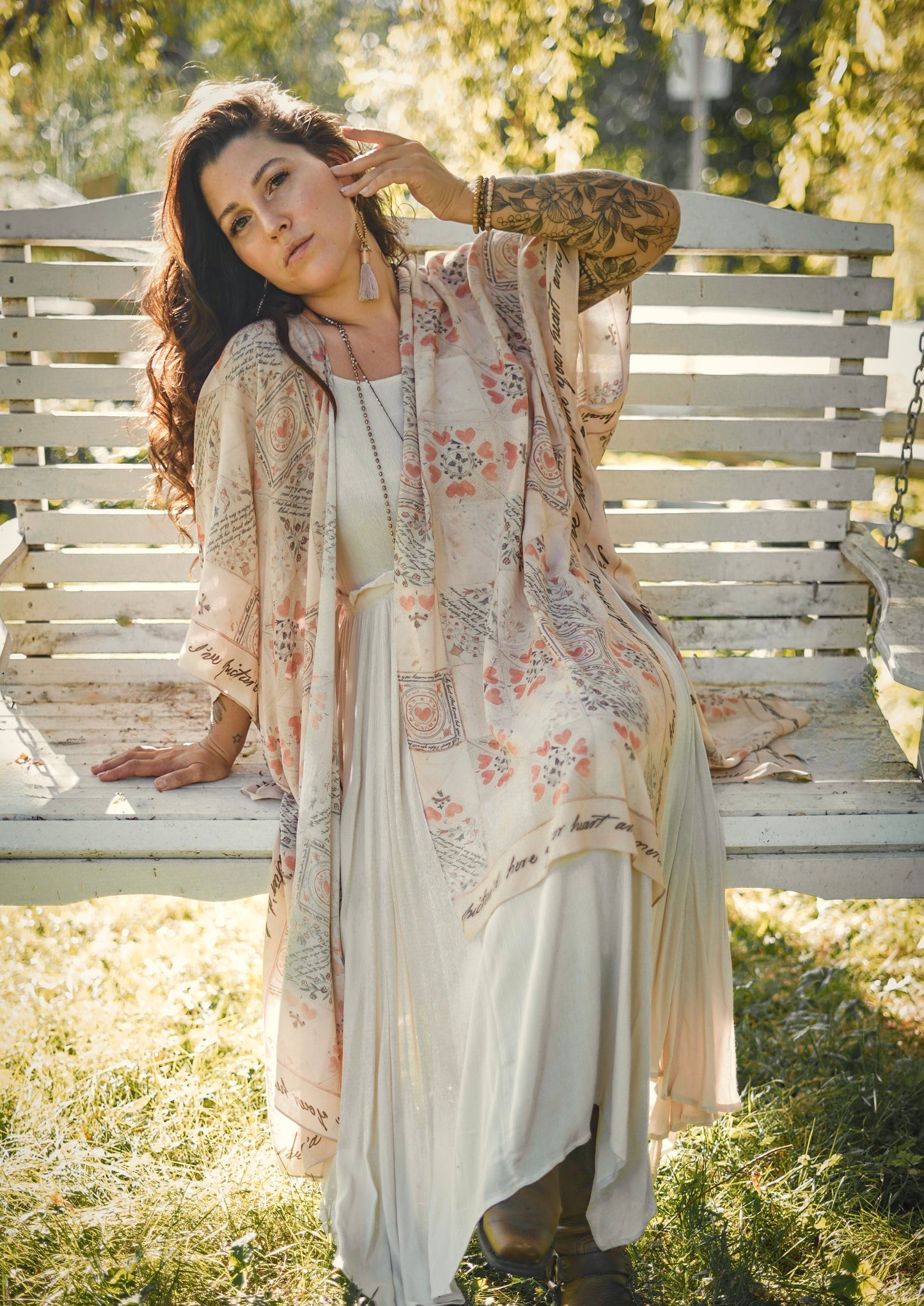 Model wearing romantic kimono with patchwork pattern made from a 200-year-old puzzle purse love letter featuring handwritten poetry and vintage florals – Market of Stars