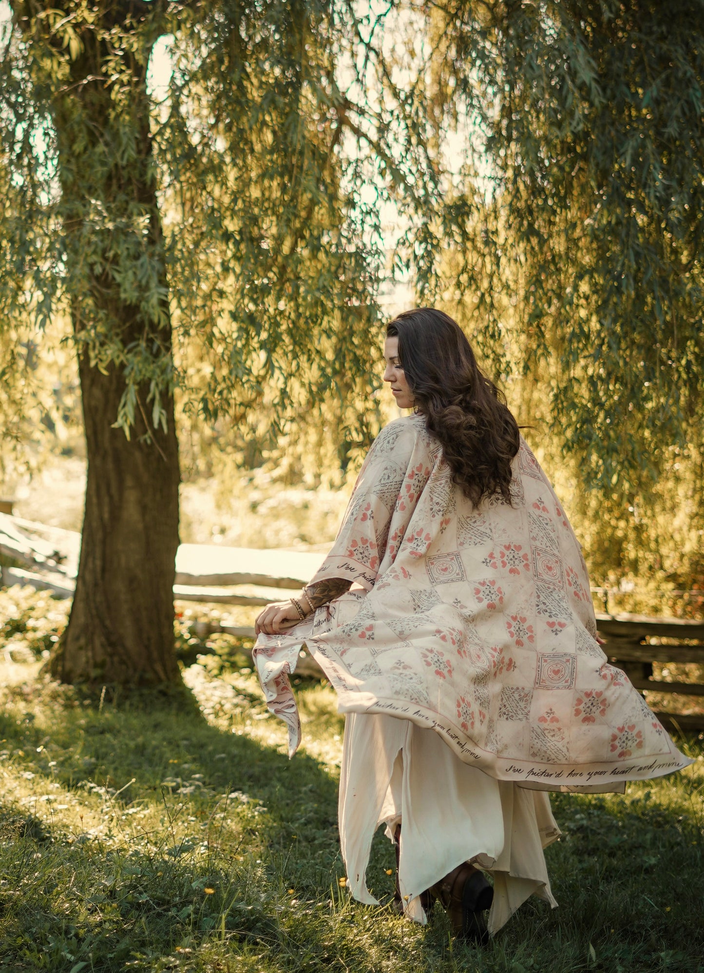 Model wearing romantic kimono with patchwork pattern made from a 200-year-old puzzle purse love letter featuring handwritten poetry and vintage florals – Market of Stars