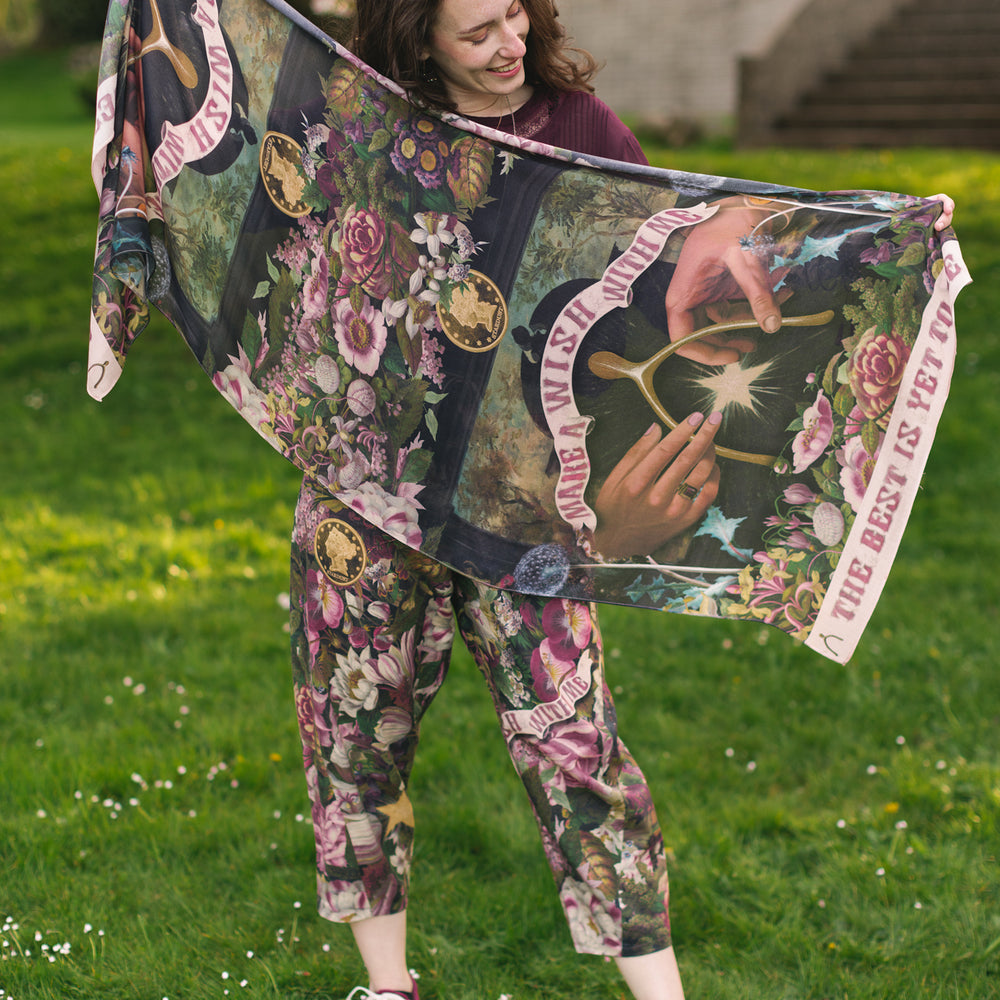 
                  
                    Scarf featuring gold wishbone–vintage coin–evening star–and dandelion artwork with lilacs and “Make a wish” banner – Market of Stars
                  
                
