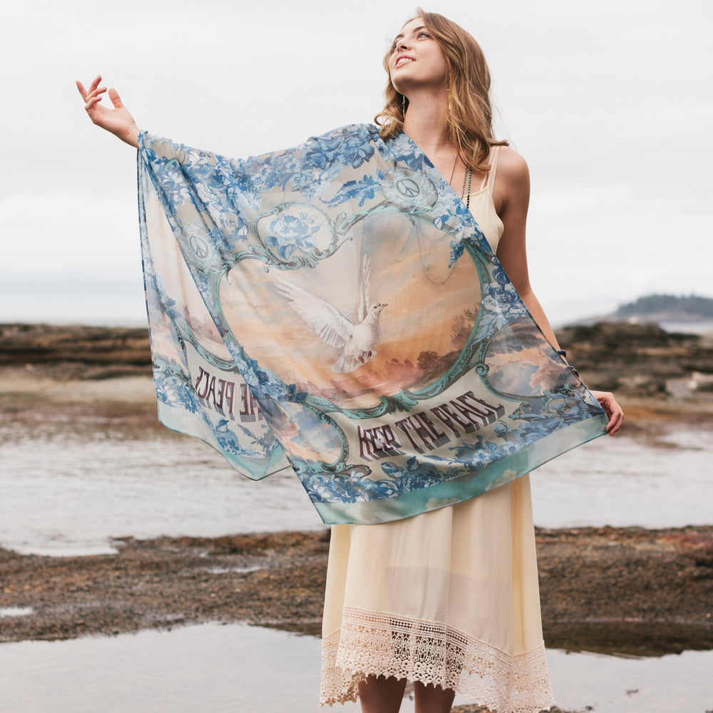 Model wearing a light, airy bamboo-based viscose scarf to wrap yourself in good vibes, wanderlust, and a little rebellion - Market of Stars