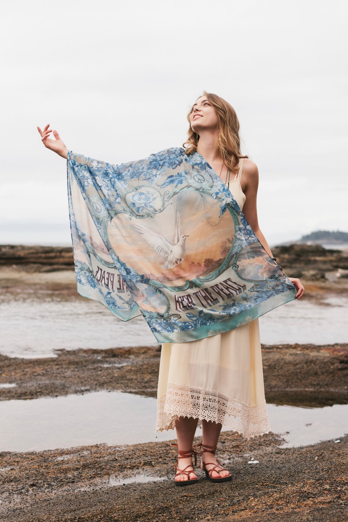Model wearing a light, airy bamboo-based viscose scarf to wrap yourself in good vibes, wanderlust, and a little rebellion - Market of Stars