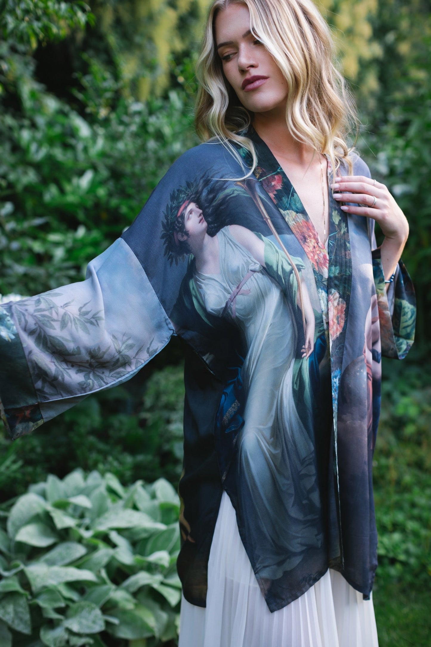 Model wearing Peace, Wine & Sunshine Bohéme Slip Dress featuring botanical collages and playful peace, wine and sunshine lettering on the hem – Market of Stars.