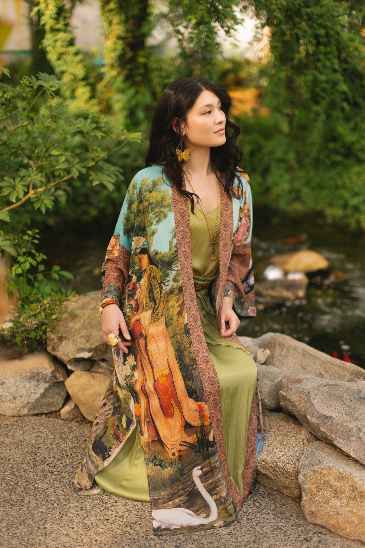 Model wearing Peace, Wine & Sunshine Bohéme Slip Dress featuring botanical collages and playful peace, wine and sunshine lettering on the hem – Market of Stars.