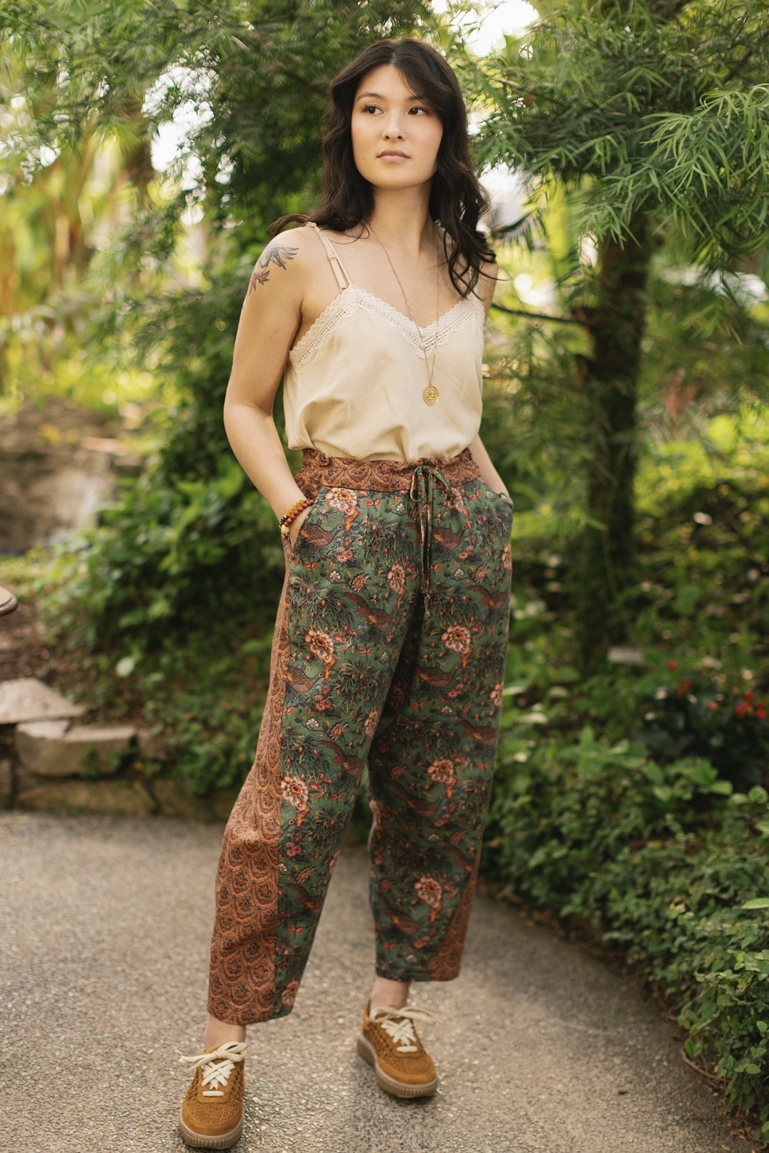 Model wearing Peace, Wine & Sunshine Bohéme Slip Dress featuring botanical collages and playful peace, wine and sunshine lettering on the hem – Market of Stars.