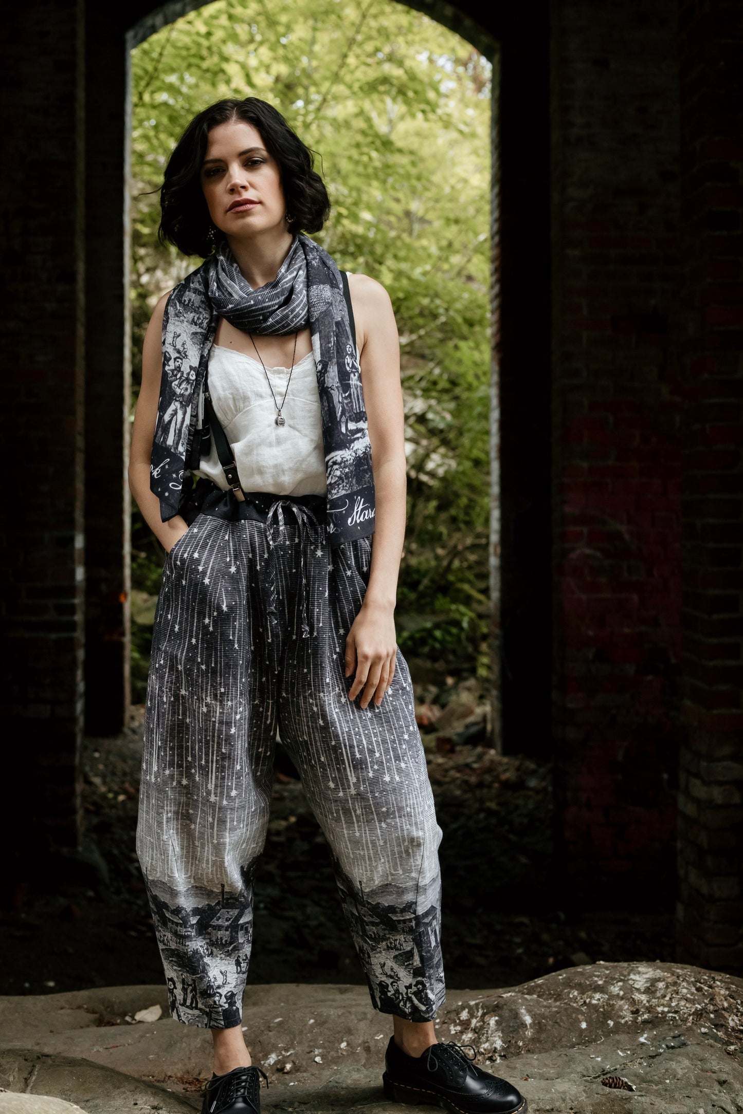Model wearing Peace, Wine & Sunshine Bohéme Slip Dress featuring botanical collages and playful peace, wine and sunshine lettering on the hem – Market of Stars.