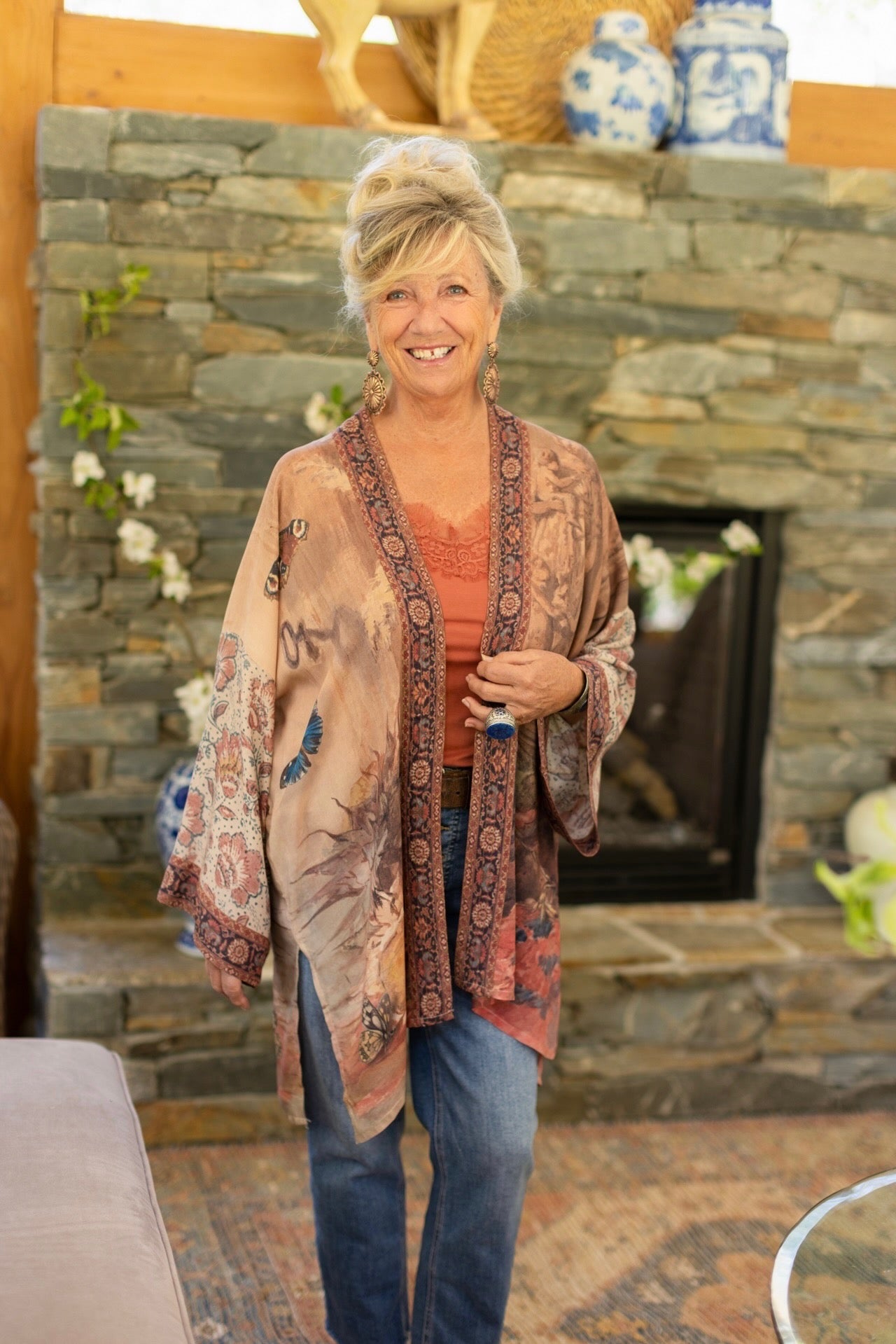 Model(s) wearing The Storyteller -- a mid-length Matinée kimono duster featuring antique artwork and vintage prints from around the world -- Market of Stars
