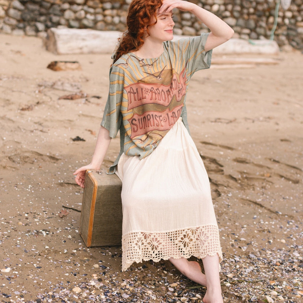 
                  
                    Soft bamboo-based tee featuring antique nautical artwork with shells, sunshine, and mermaid – Market of Stars
                  
                