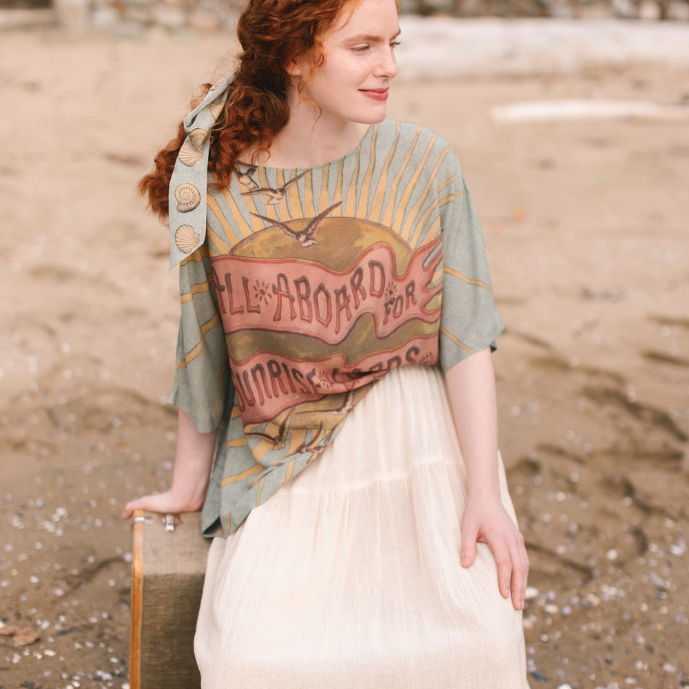 
                  
                    Soft bamboo-based tee featuring antique nautical artwork with shells, sunshine, and mermaid – Market of Stars
                  
                