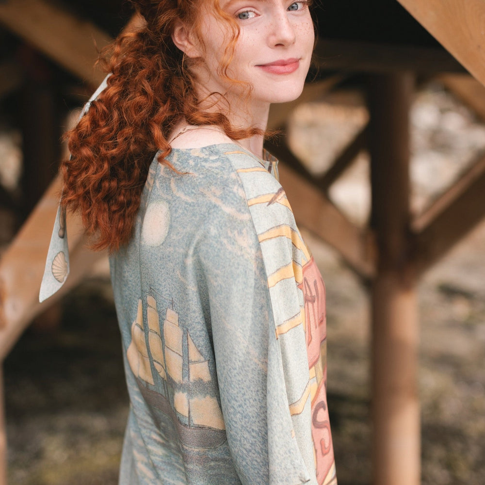 
                  
                    Soft bamboo-based tee featuring antique nautical artwork with shells, sunshine, and mermaid – Market of Stars
                  
                