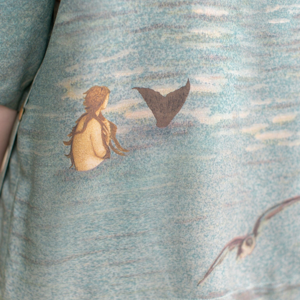 
                  
                    Soft bamboo-based tee featuring antique nautical artwork with shells, sunshine, and mermaid – Market of Stars
                  
                