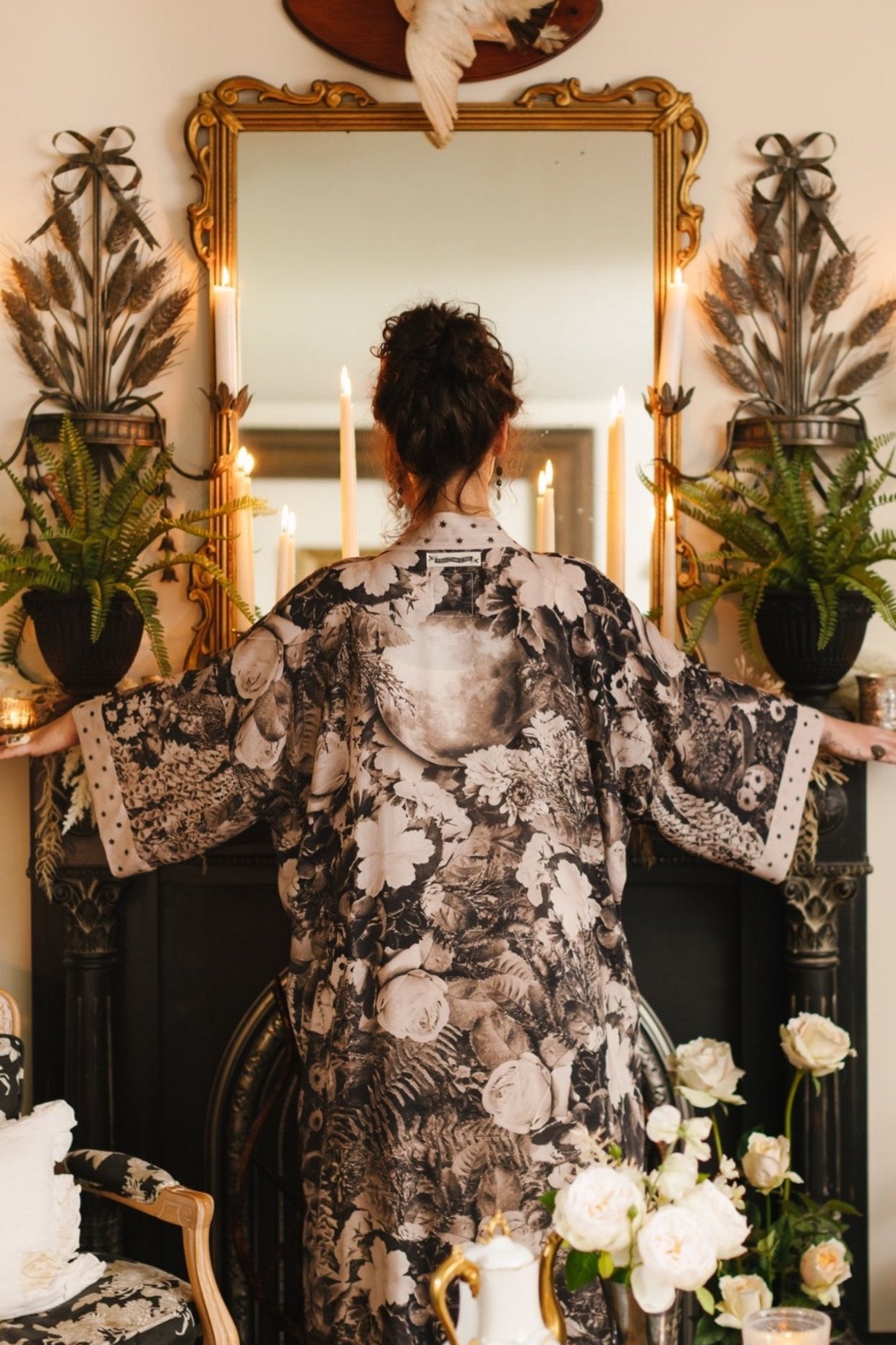 Model wearing Looking Glass Opera Robe featuring grown-up Alice Liddell, Victorian botanicals, and celestial star and moon accents inspired by Wonderland – Market of Stars.