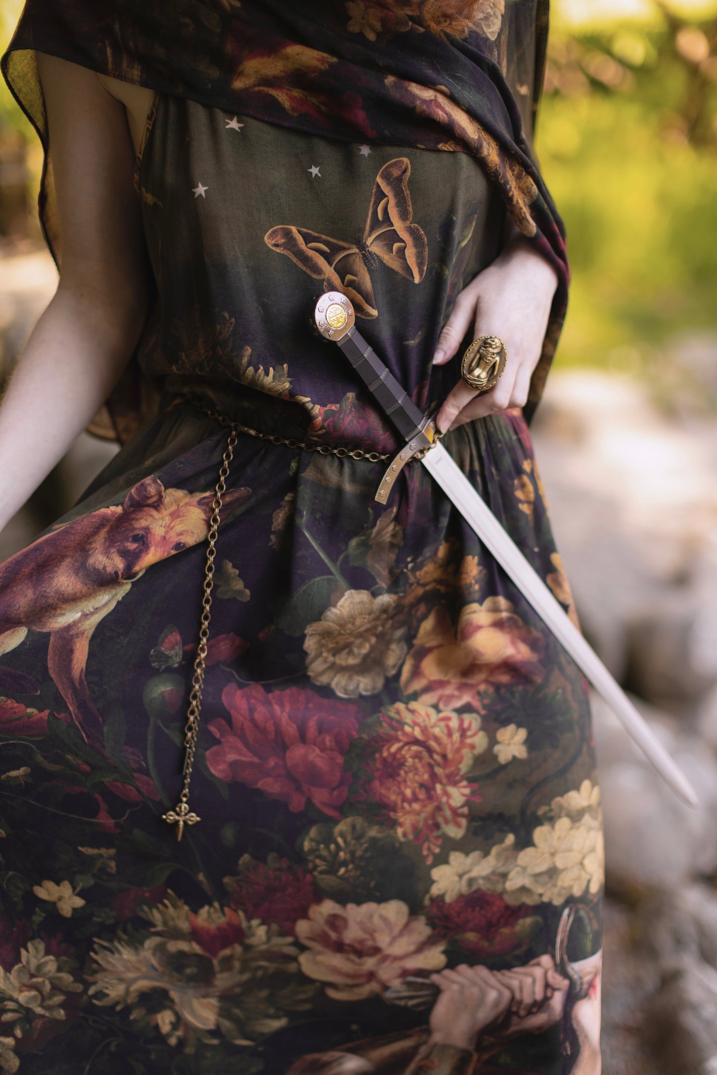 Model wearing a maxi-length bamboo-viscose slip dress featuring florals from centuries-old paintings and Rosetti’s iconic portrait of Joan of Arc - Market of Stars