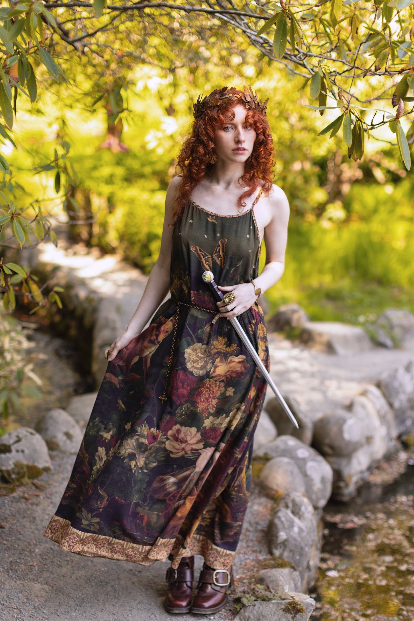 Model wearing a maxi-length bamboo-viscose slip dress featuring florals from centuries-old paintings and Rosetti’s iconic portrait of Joan of Arc - Market of Stars