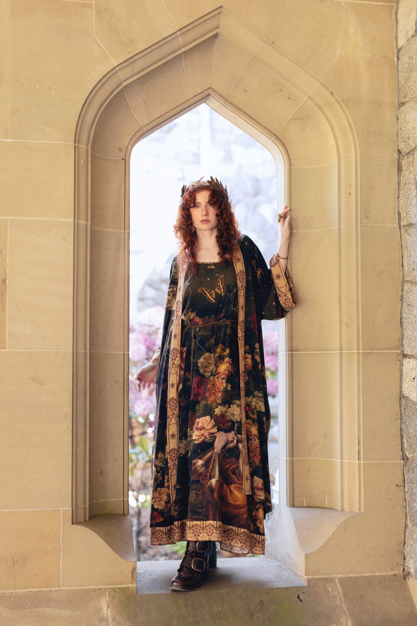 Model wearing a maxi-length bamboo-viscose slip dress featuring florals from centuries-old paintings and Rosetti’s iconic portrait of Joan of Arc - Market of Stars