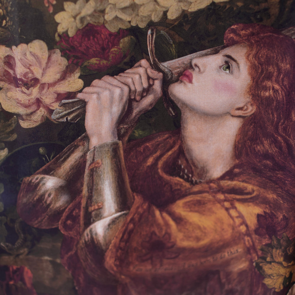 
                  
                    Model wearing a maxi-length bamboo-viscose slip dress featuring florals from centuries-old paintings and Rosetti’s iconic portrait of Joan of Arc - Market of Stars
                  
                