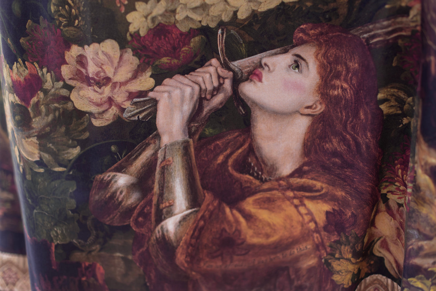Model wearing a maxi-length bamboo-viscose slip dress featuring florals from centuries-old paintings and Rosetti’s iconic portrait of Joan of Arc - Market of Stars