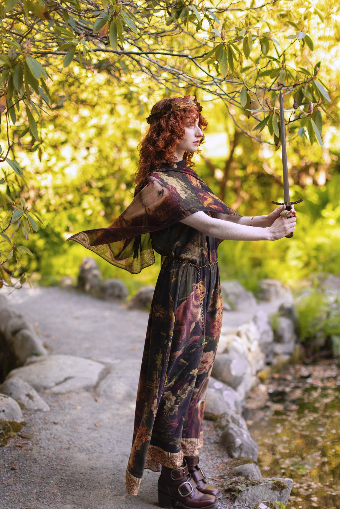 Model wearing a maxi-length bamboo-viscose slip dress featuring florals from centuries-old paintings and Rosetti’s iconic portrait of Joan of Arc - Market of Stars