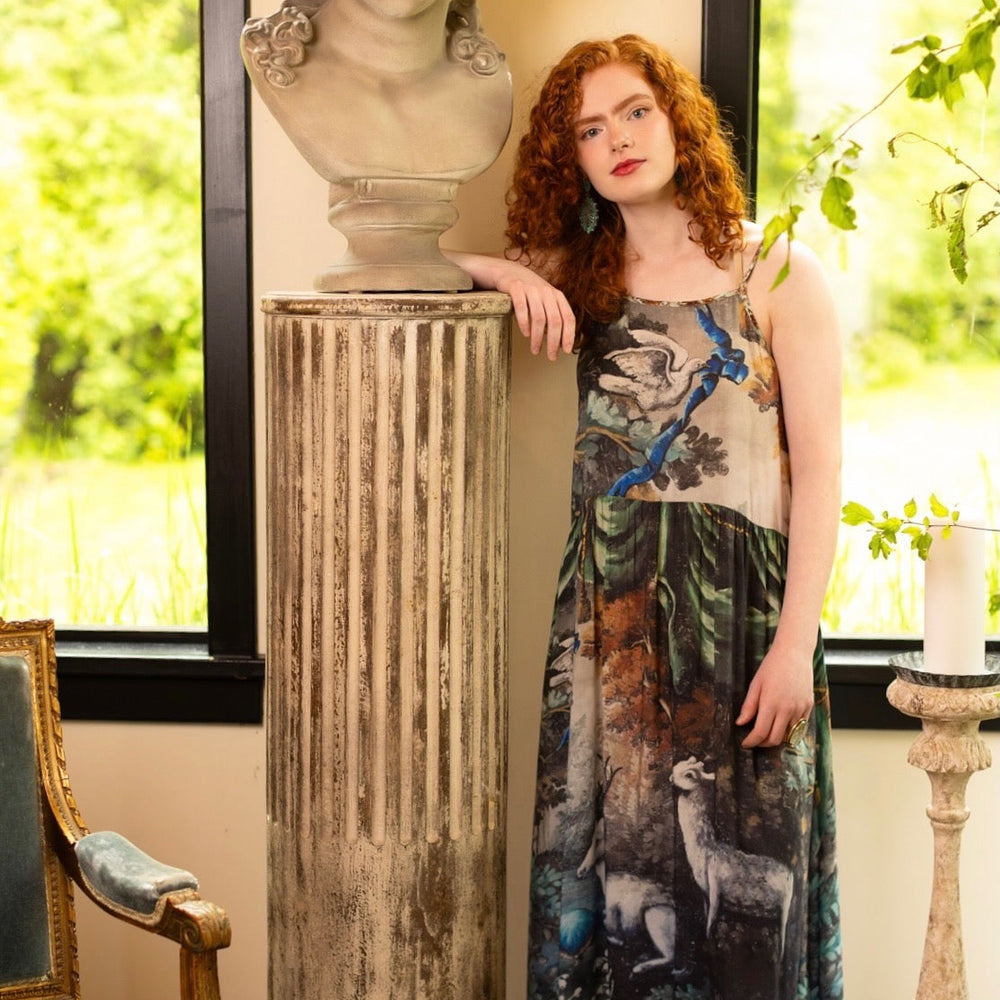 
                  
                    Model wearing our Theatre of Dreams Slip Dress featuring whimsical deer and birds from Jennifer Lanne’s romantic paintings – Market of Stars
                  
                