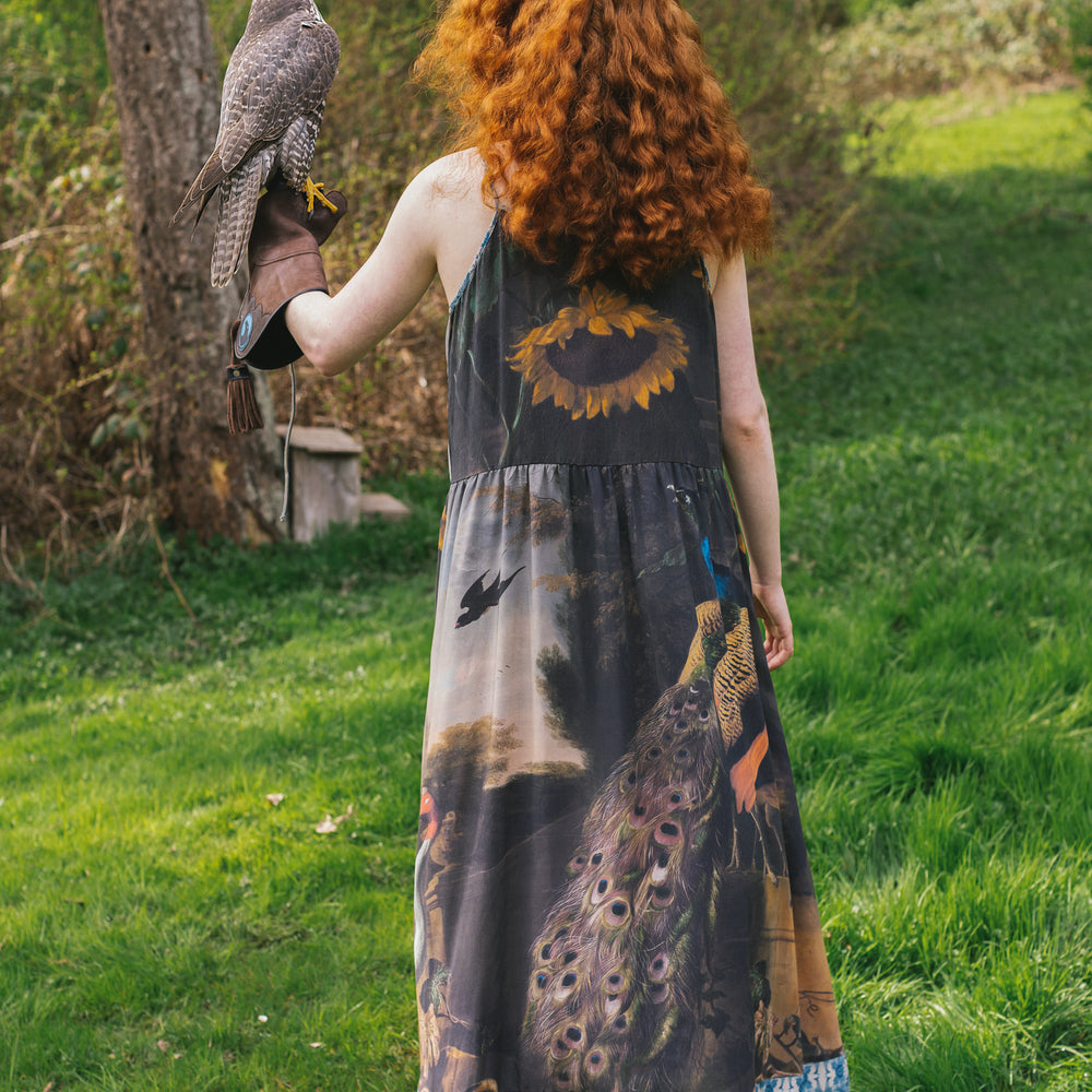 
                  
                    Model wearing Wild Beauty Bohéme Slip Dress featuring peacock birds and antique florals – Market of Stars
                  
                