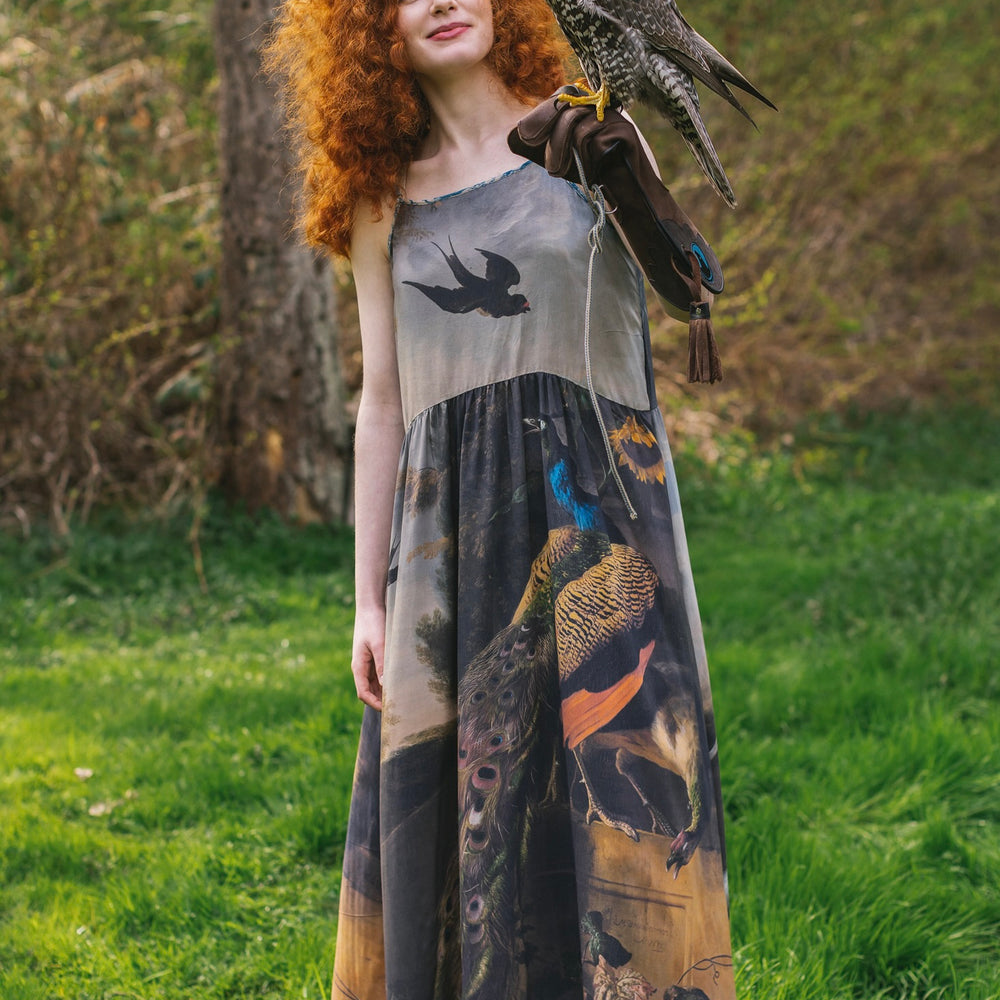 
                  
                    Model wearing Wild Beauty Bohéme Slip Dress featuring peacock birds and antique florals – Market of Stars
                  
                