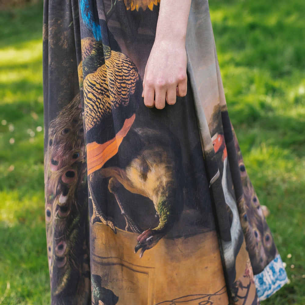 
                  
                    Model wearing Wild Beauty Bohéme Slip Dress featuring peacock birds and antique florals – Market of Stars
                  
                