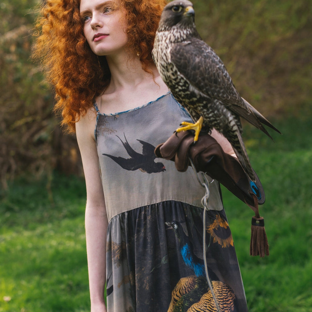 
                  
                    Model wearing Wild Beauty Bohéme Slip Dress featuring peacock birds and antique florals – Market of Stars
                  
                