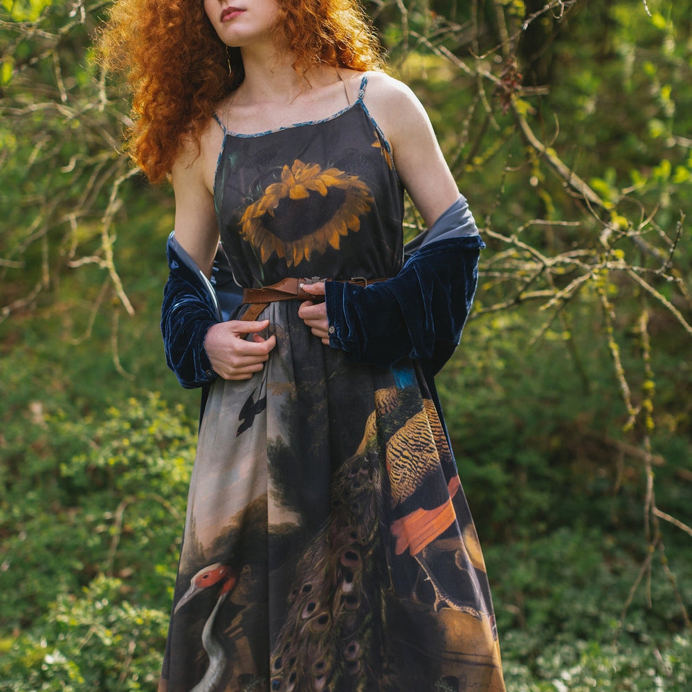 
                  
                    Model wearing Wild Beauty Bohéme Slip Dress featuring peacock birds and antique florals – Market of Stars
                  
                