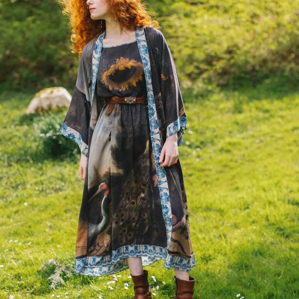 
                  
                    Model wearing Wild Beauty Bohéme Slip Dress featuring peacock birds and antique florals – Market of Stars
                  
                