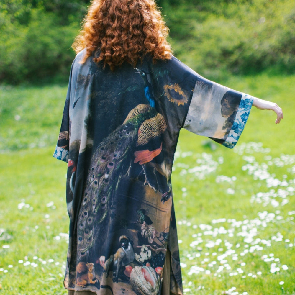 Model wearing Wild Beauty Opera Duster with antique lush florals and peacock – Market of Stars